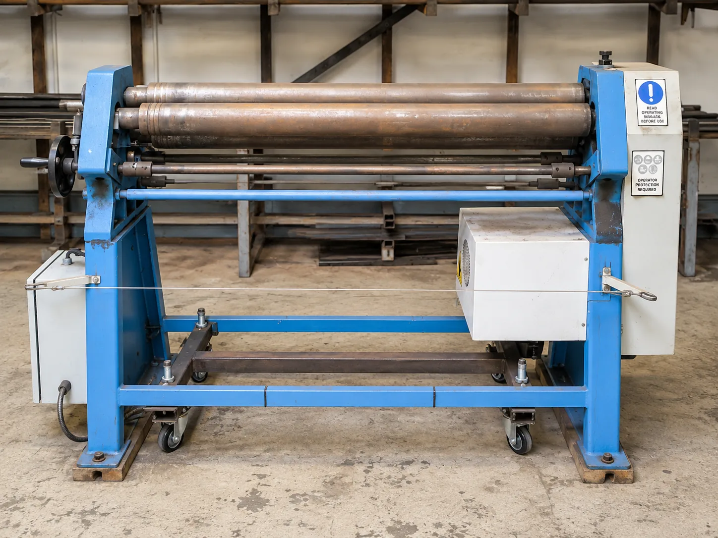 The floor-standing plate roller in the workshop