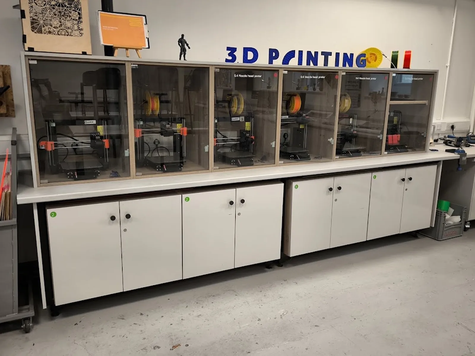 The bank of Prusa MK4 3D printers